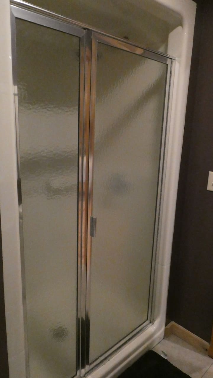Glass-enclosed shower