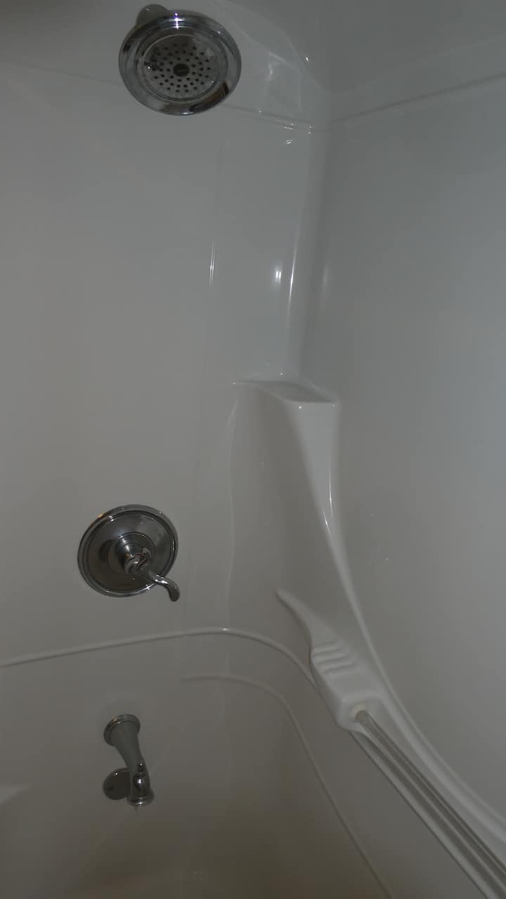 Shower fixtures and surround